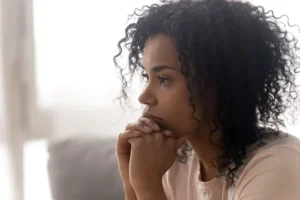 Sad black woman dealing with vaginismus